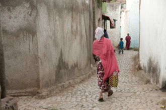 ethiopian woman walking on a street